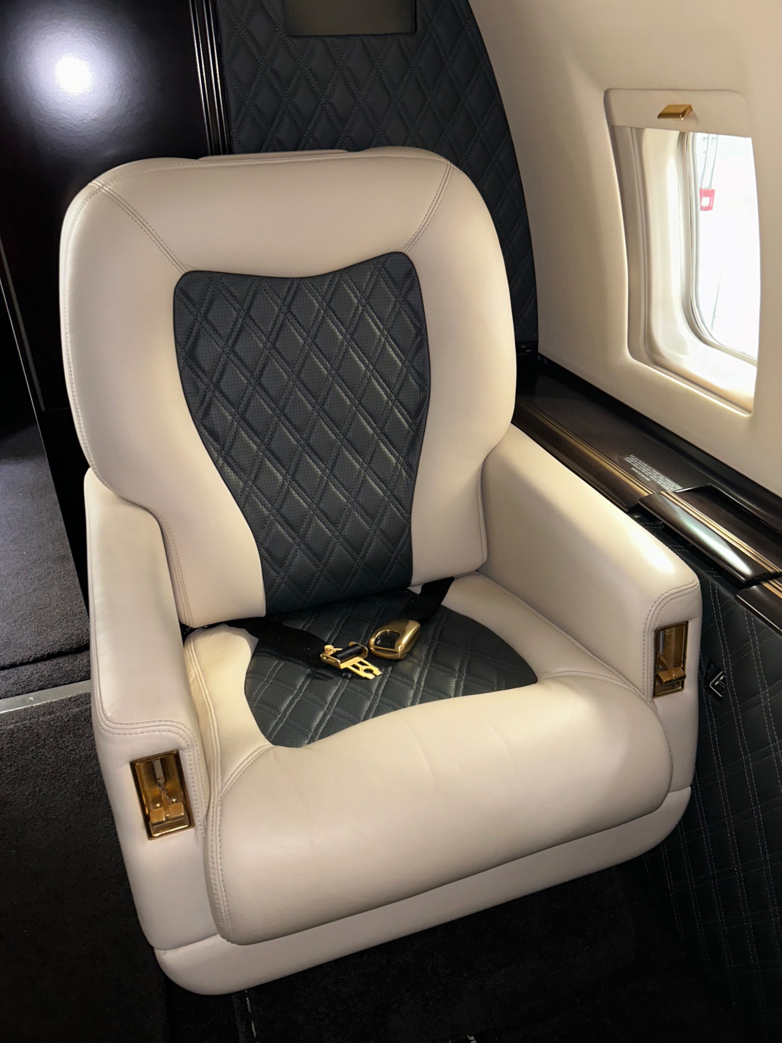 Clean upholstered seat in a private aircraft cabin