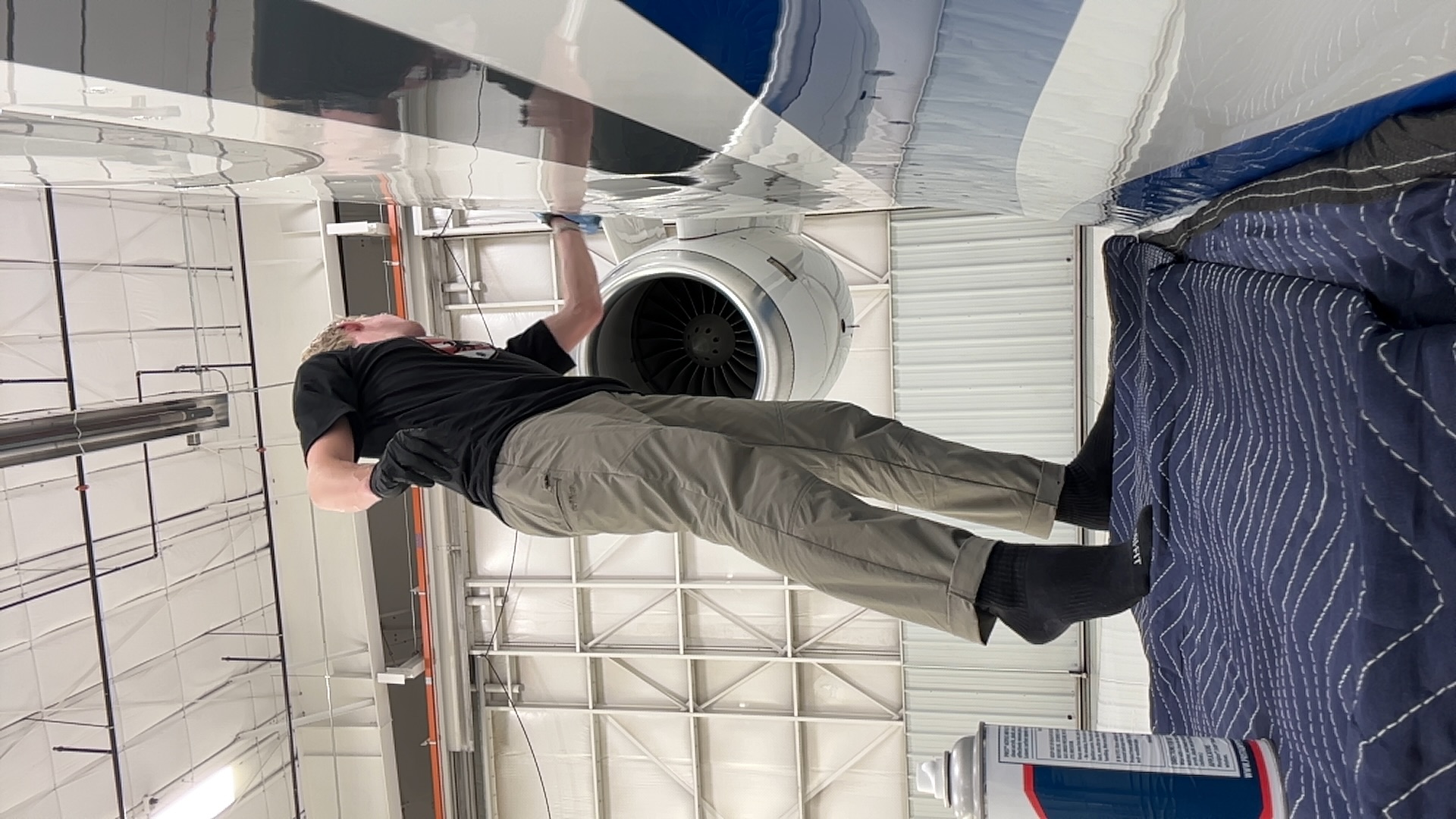 Beebe Detailing at work on an aircraft in a hangar